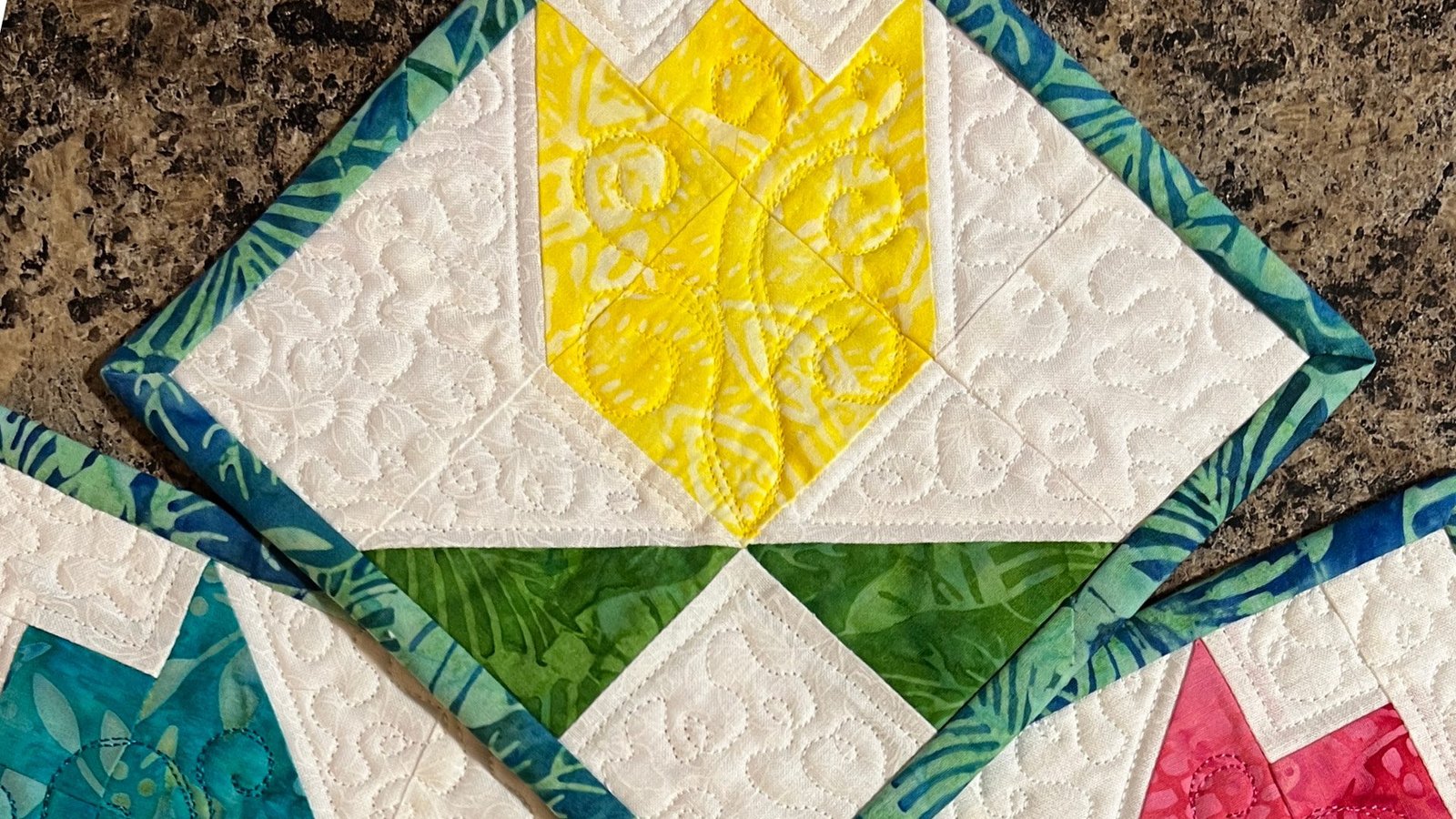 Color Your World with Spring Splendor Mug Mats - Quilted Dreams